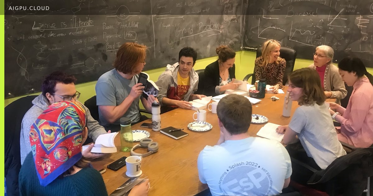 MIT students in a seminar circle discussing a classic text with faculty