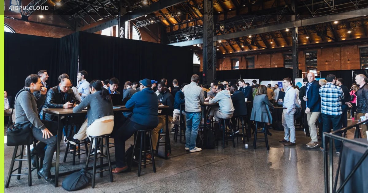 Networking lounge at TechCrunch Founder Summit 2026 with founders in focused conversation